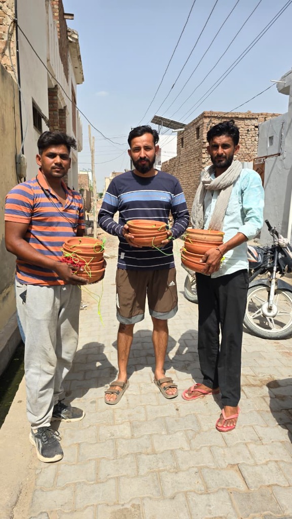 Distributing Clay Bird Feeders